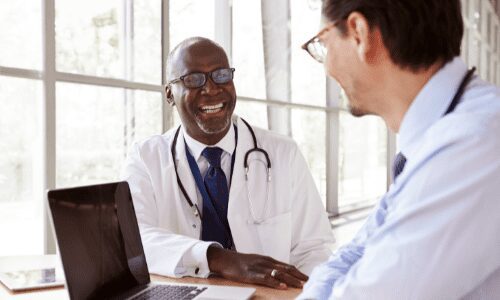 doctor enjoying a conversation with patient